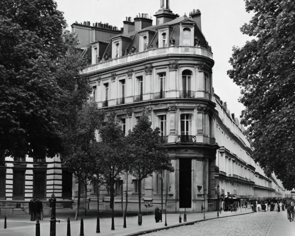 Monochrome street scene with corner building, pedestrians, and trees under cloudy sky