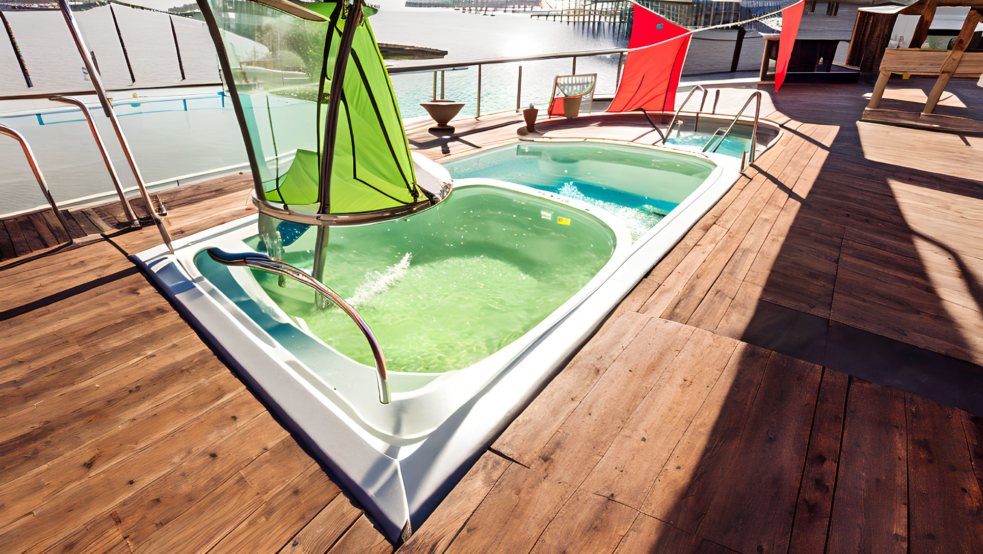 Luxurious Outdoor Jacuzzi on Wooden Deck with Slide and Waterfront Views