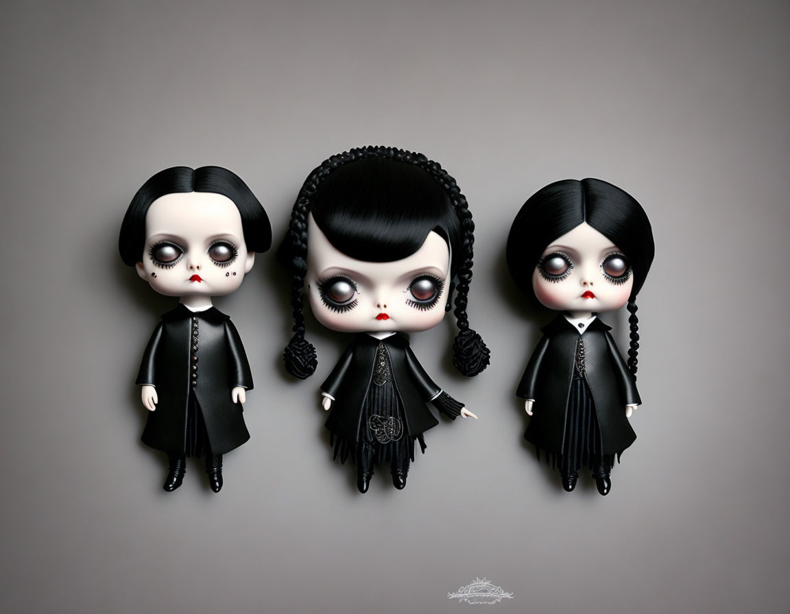 Three gothic-style dolls with large heads and dark clothing on grey backdrop