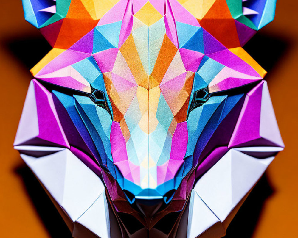 Vibrant origami wolf head with geometric patterns on orange backdrop