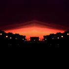 Cosmic scene with bright star-like object in glowing orange nebulous ring