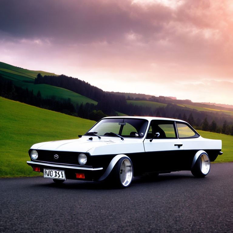 Classic Black Coupe on Road with Green Landscape and Dramatic Sky