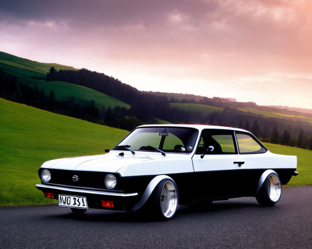 Classic Black Coupe on Road with Green Landscape and Dramatic Sky