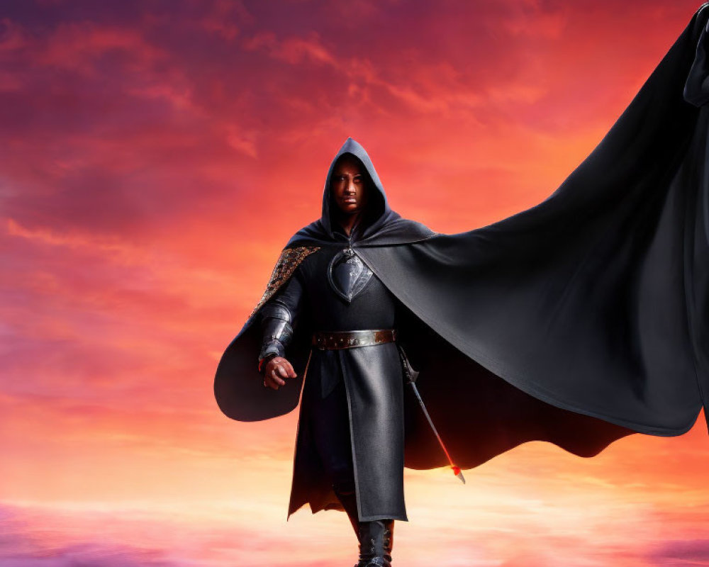 Mysterious figure in dark cloak against vibrant sky