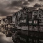 Picturesque Canal Scene with Historic Buildings at Sunset