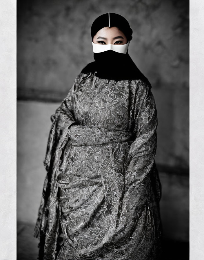 Confident Woman in Dark-Patterned Garment and Mask