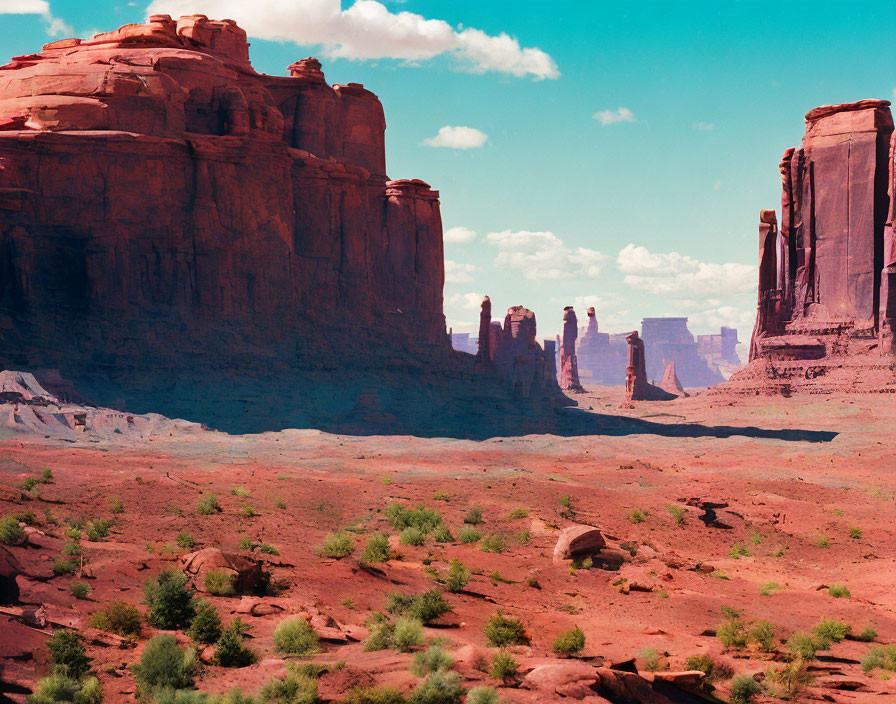 Red Sandstone Formations in Vast Desert Landscape