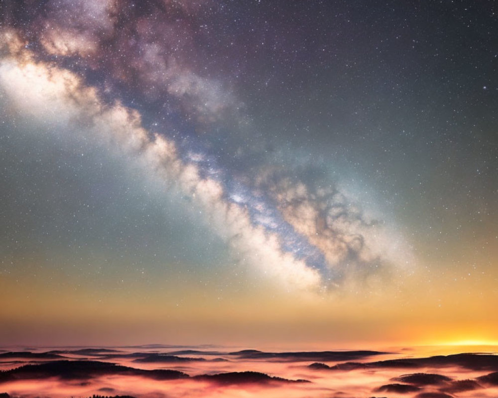 Starry Sky Over Misty Hills at Dawn