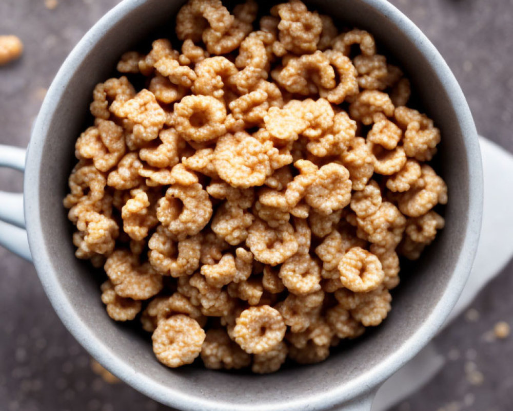 Brown Whole Grain Cereal Bowl on Dark Surface