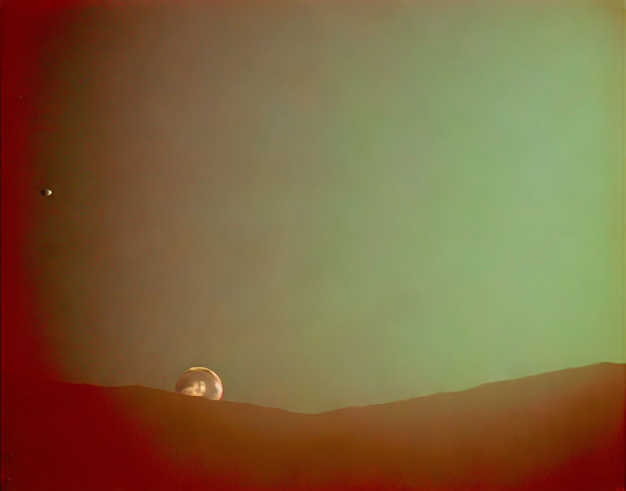 Martian sunset with landscape silhouette and two moons.