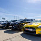 Vibrant sports cars lineup under clear sky