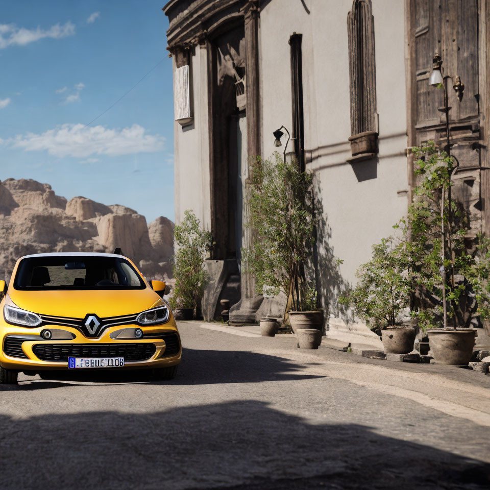 Yellow Renault car parked on cobblestone street with old buildings and rocky hills in background