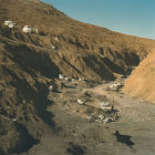 Barren desert landscape with isolated industrial structure