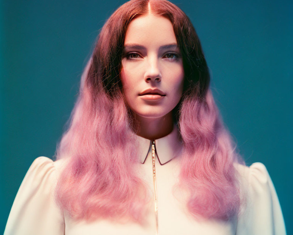 Woman with Pink Ombre Hair in White Top on Blue Background