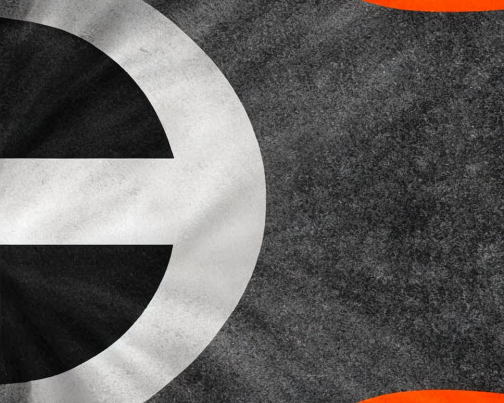 Textured flag with white circle and grey border on black and orange background