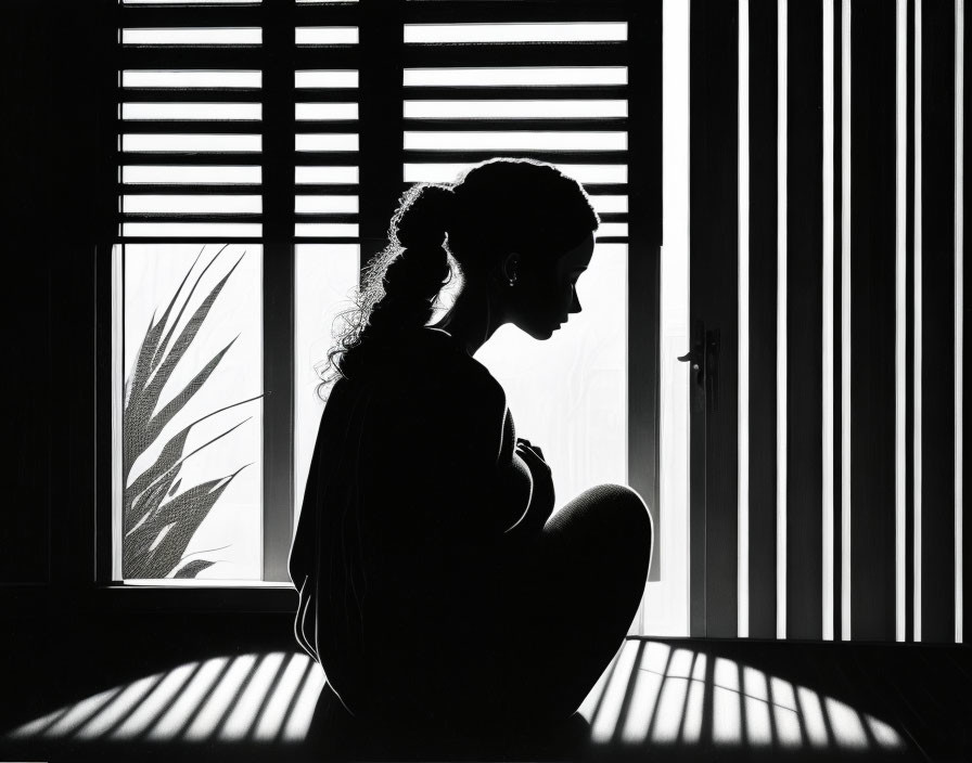 Silhouetted woman by window blinds with striped shadows and plant silhouette.