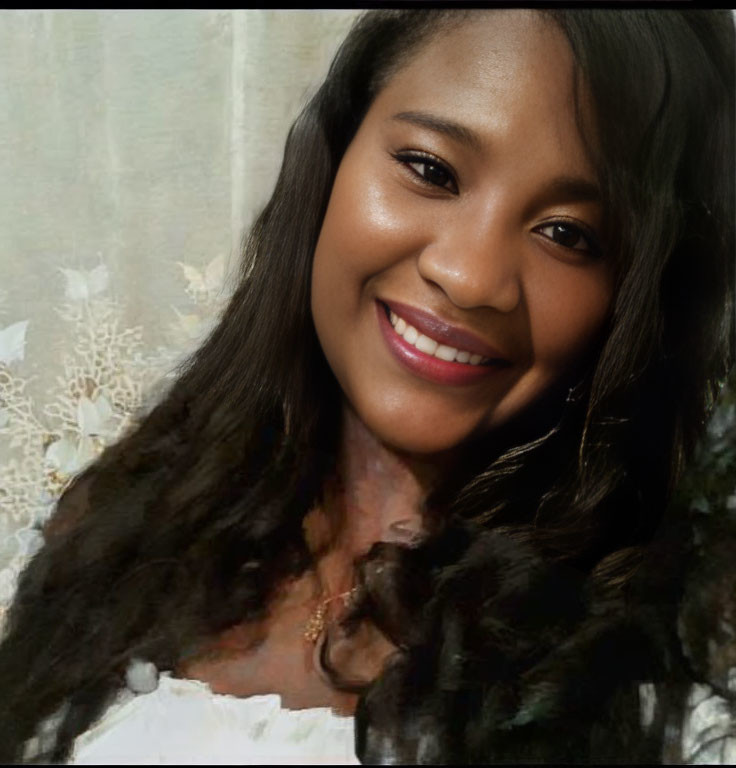 Smiling woman with long dark hair and necklace on floral background