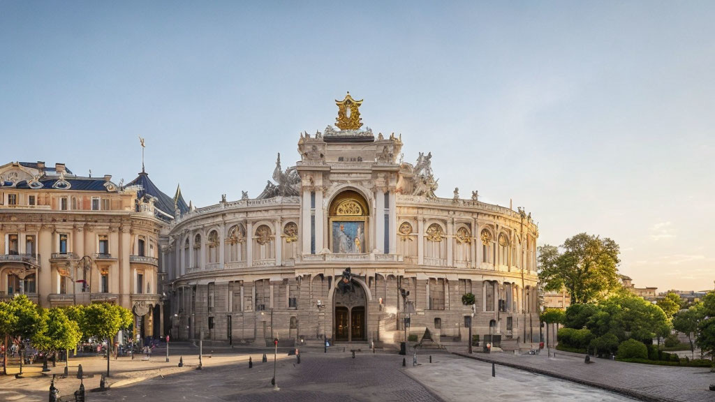 Historical building with grand facade and gold embellishments at dusk