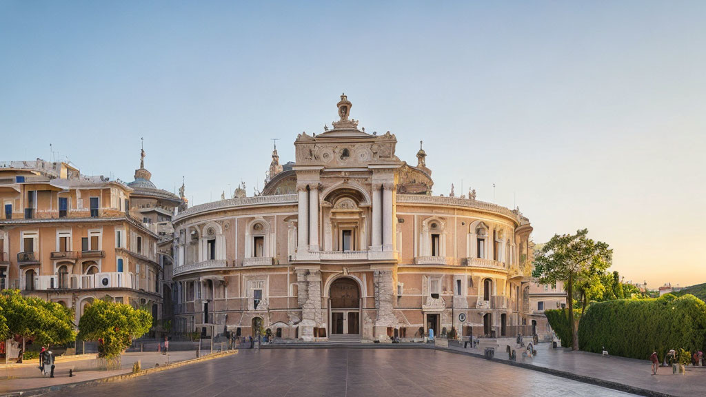 Neoclassical building with statues and columns at dusk