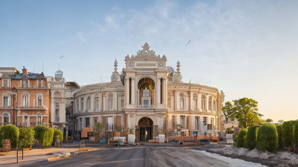 Renovated ornate building with classical architecture and construction materials at dusk