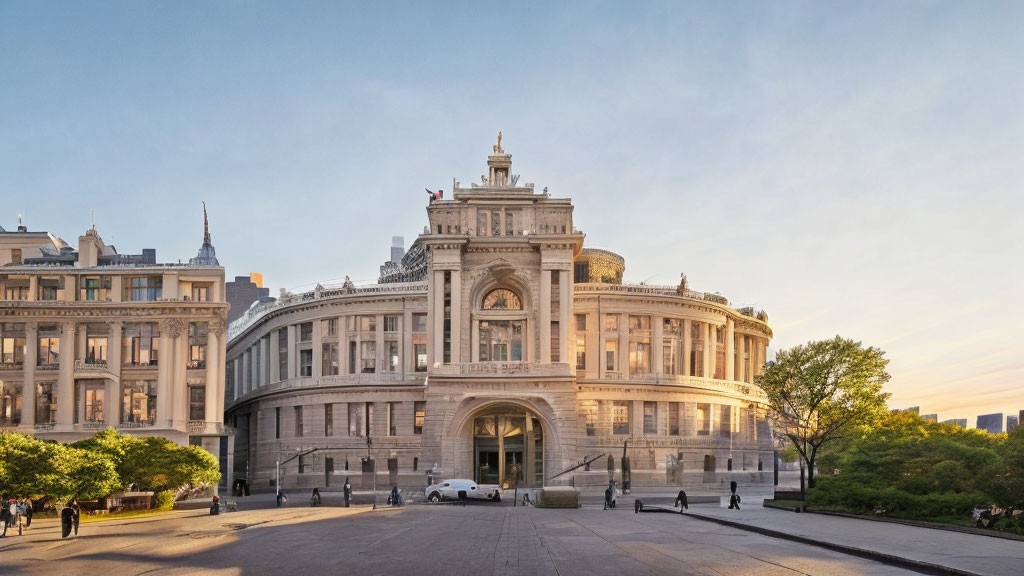 Neoclassical building with large dome and portico at sunset