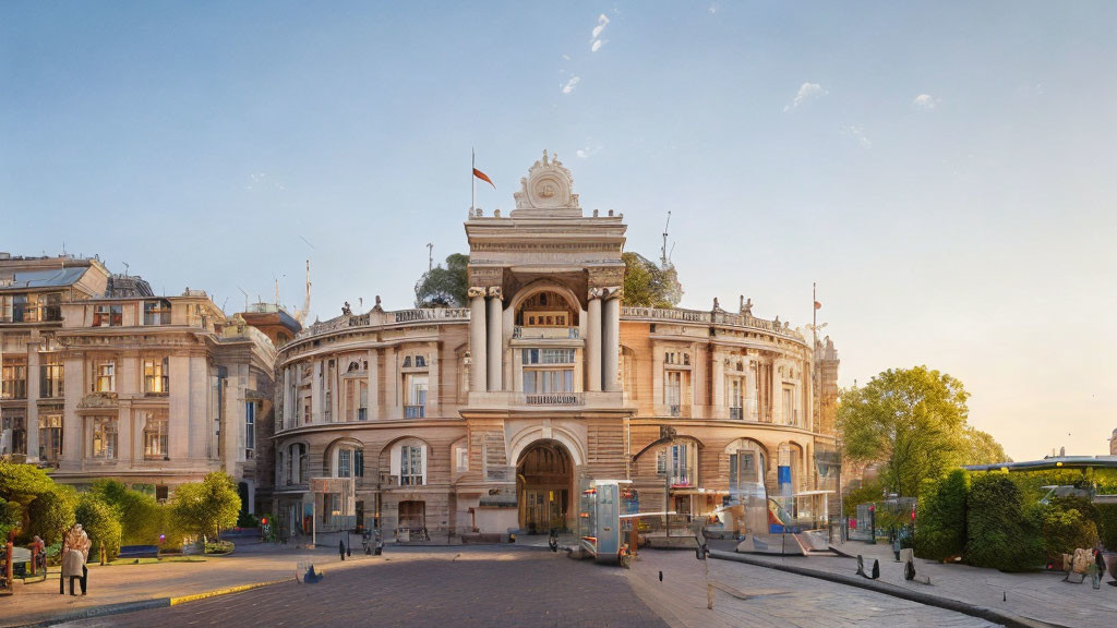 Historic building with arched entrance and sculptures in soft sunlight