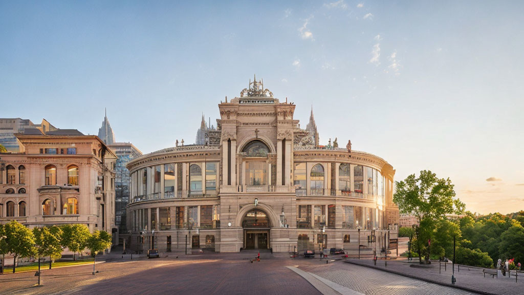 Historical building with grand façade and arched windows in golden sunset light