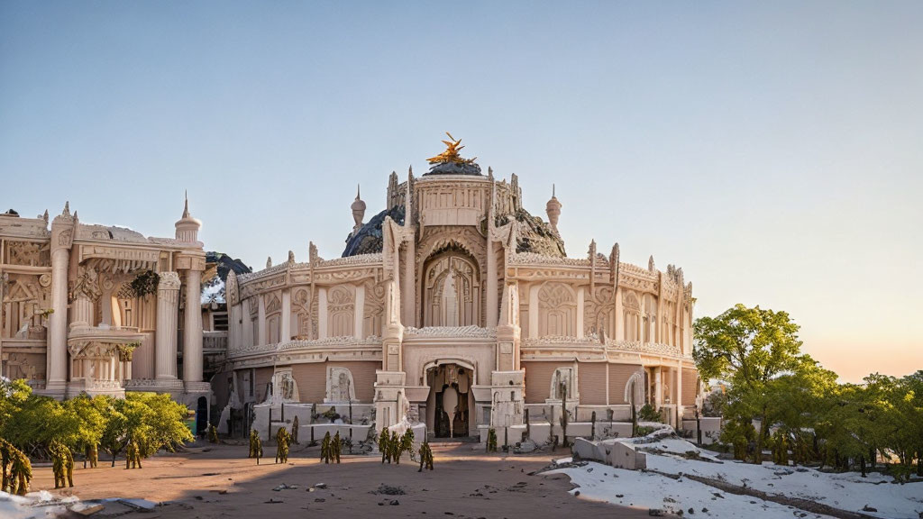 Ornate building with golden dome in desert sunset