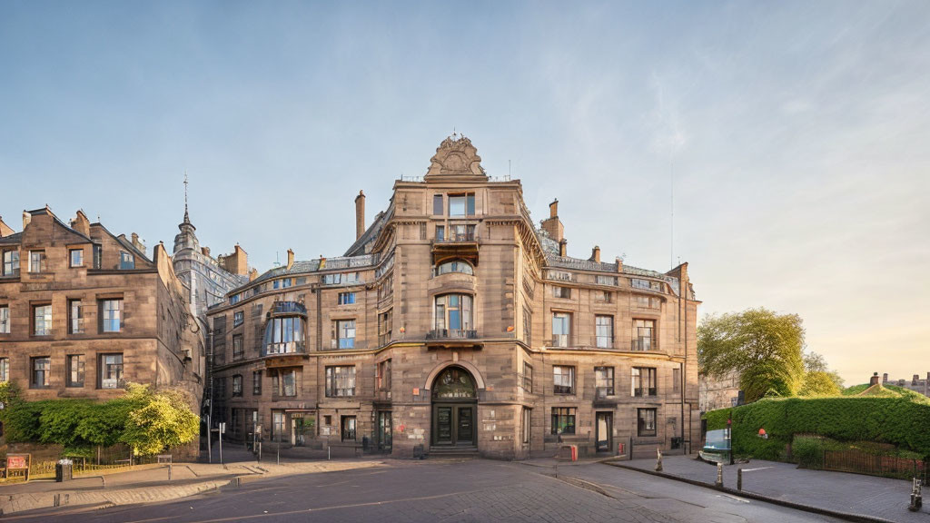 European Style Stone Building with Ornate Facade and Archway Entrance