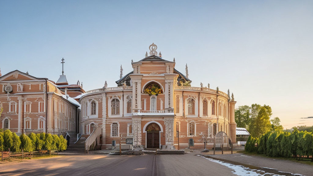 Baroque-style red and white building against blue sky