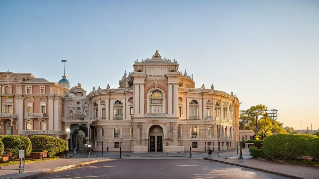 Grand classical building with dome at sunset by road