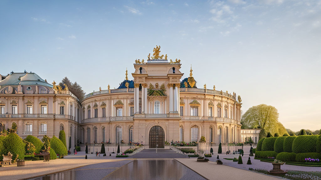 Baroque palace with golden ornaments and statues in manicured gardens