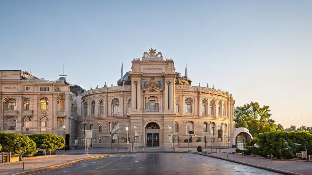 Neoclassical Building with Ornate Façades and Sculptures at Dawn