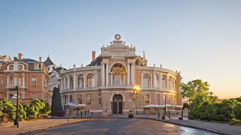 Historic building with classical facade at sunset in serene surroundings