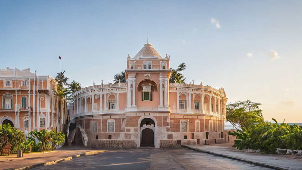 Colonial building with arched doorways in warm sunlight