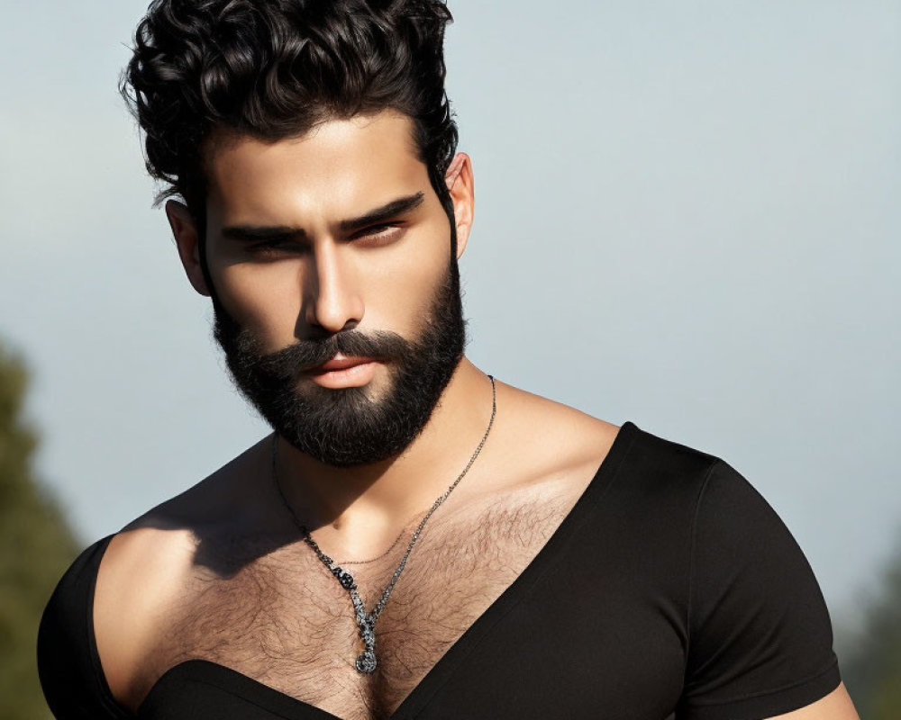 Curly Haired Man in Black V-Neck Shirt and Beard Portrait