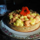 Almond Flake and Orange Rose Decorated Cake on Ornate Plate