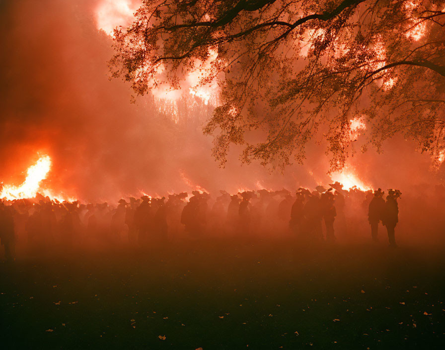 People under autumn trees in smoky orange atmosphere