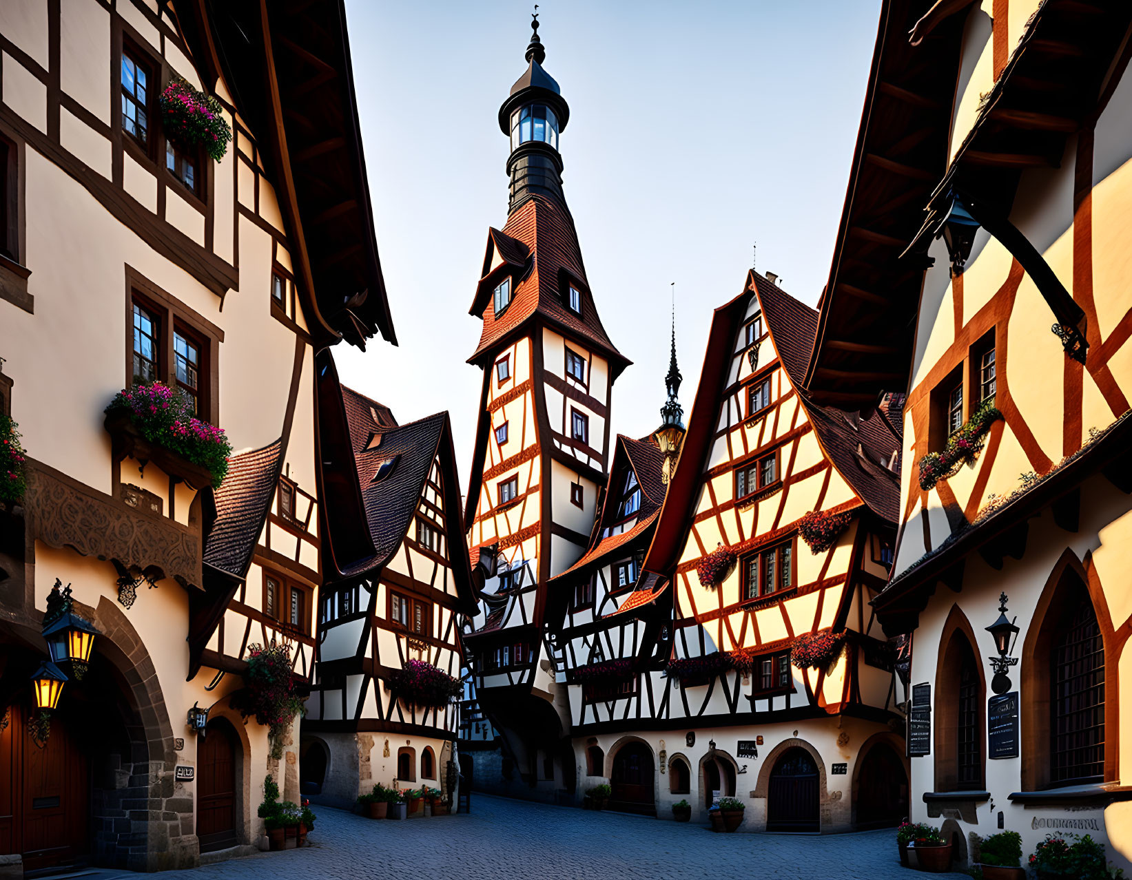 European Timber Framed Buildings on Cobblestone Street at Sunrise or Sunset