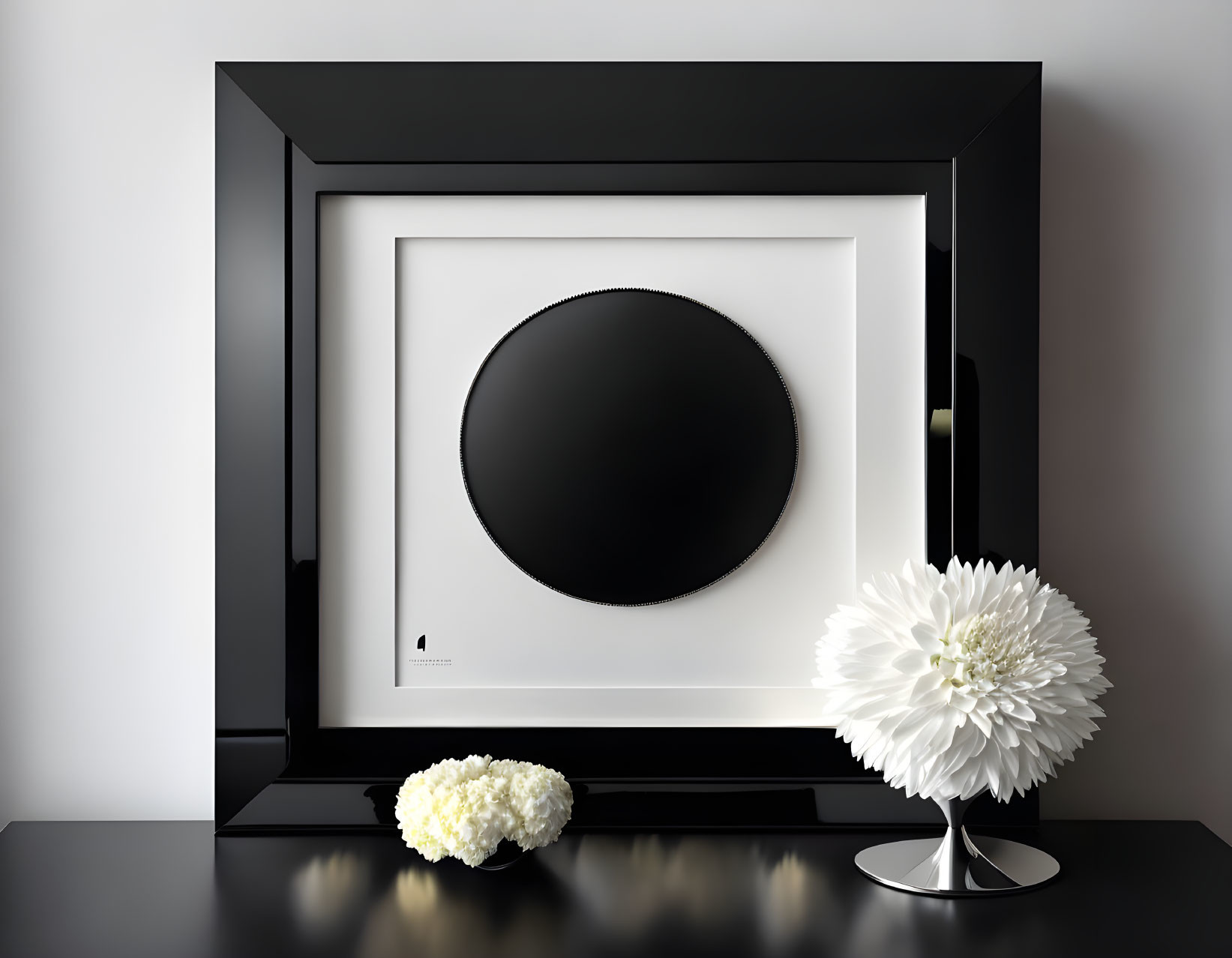 Minimalist Black Circle Artwork with White Flowers on Shelf