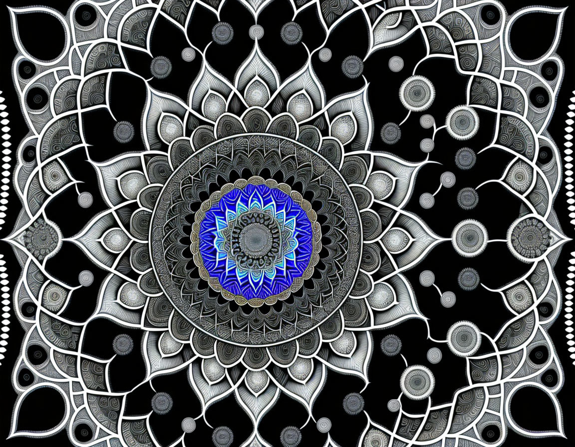 Detailed silver and blue mandala on black background