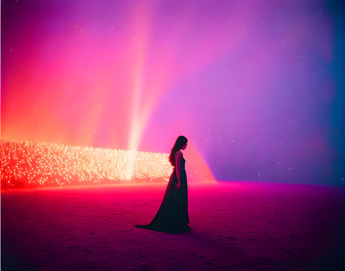 Silhouette of woman in long dress against vibrant pink and blue backdrop