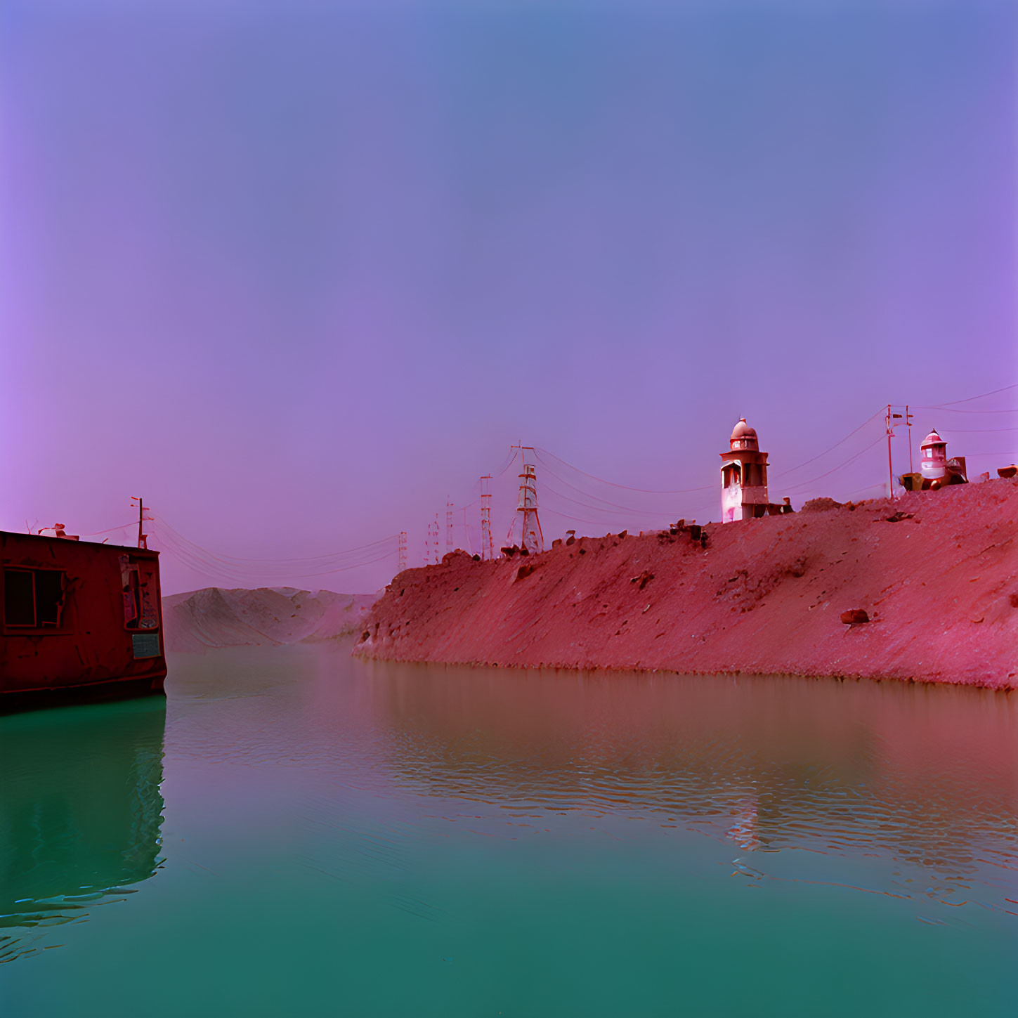 Surreal color-shifted landscape with red boat, twin lighthouses, and calm water