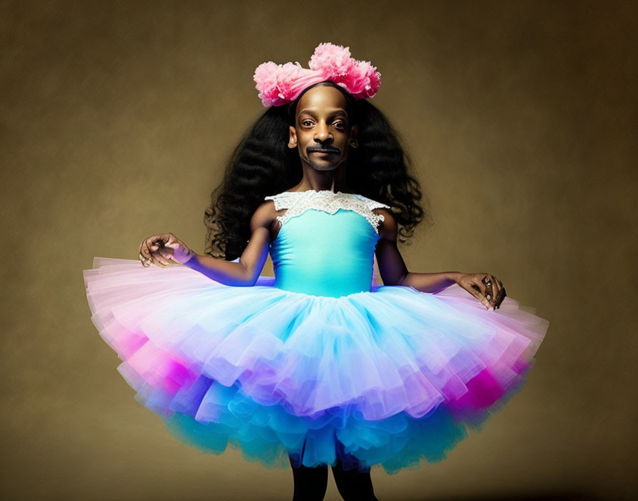 Colorful Tutu and Flower Headband on Young Girl Against Beige Backdrop