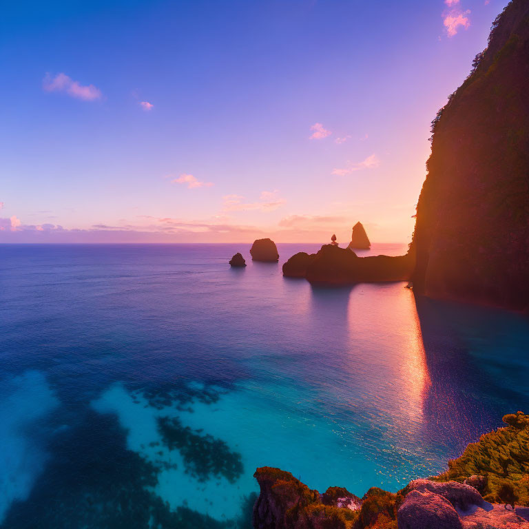 Serene sea at twilight with rocky islets and gradient sky