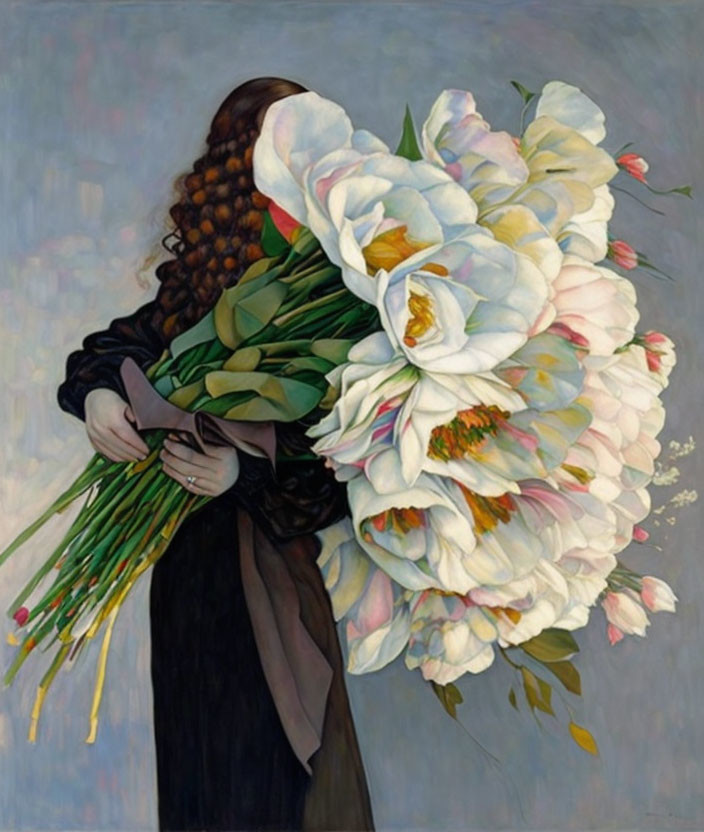 Woman with long wavy hair holding oversized bouquet of white flowers