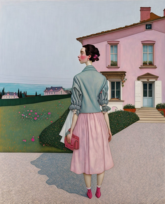 Woman in vintage pink skirt and blue jacket standing near pink house and hills, holding red purse