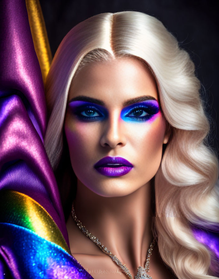 Portrait of Person with Platinum Blonde Hair and Striking Makeup on Colorful Fabric