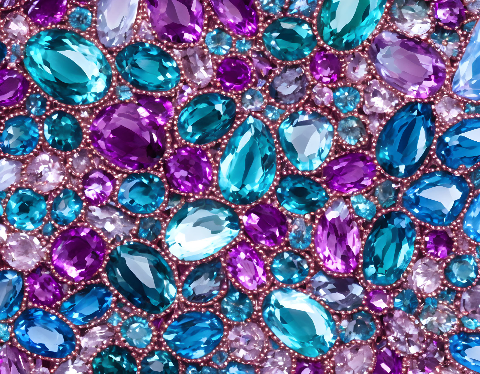 Vibrant Blue, Purple, and Pink Gemstones in Detailed Array