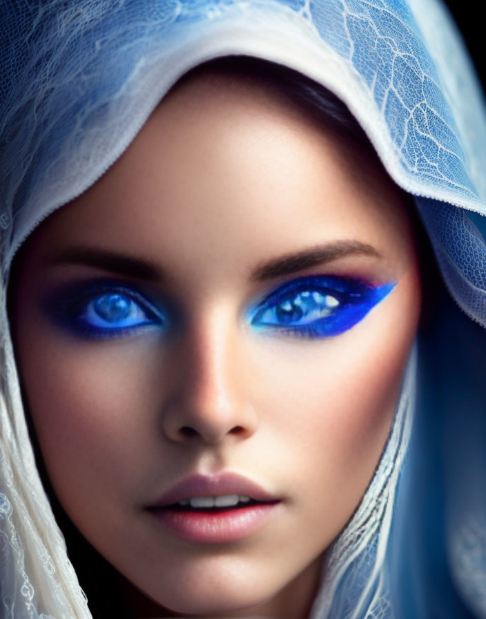 Striking Blue Eye Makeup and Translucent Blue Veil Beauty